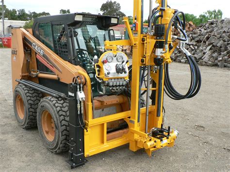 skid steer attachment rock|skid steer mounted drill rig.